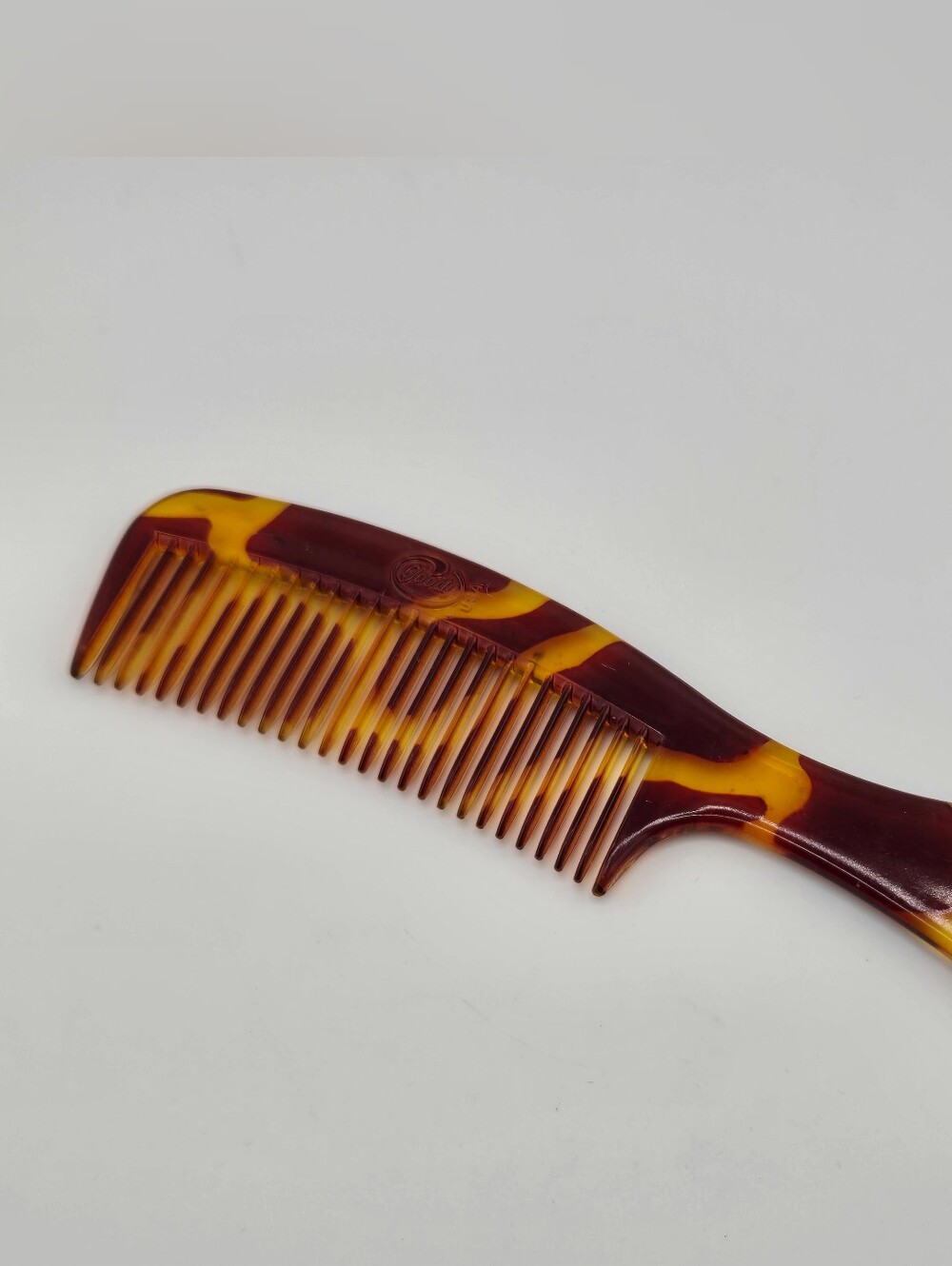 Vtg Goody comb featuring a "mock tortoise" shell marbled pattern